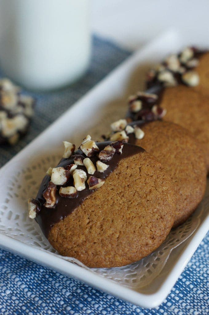 Hazelnut cookies served on a white plate.