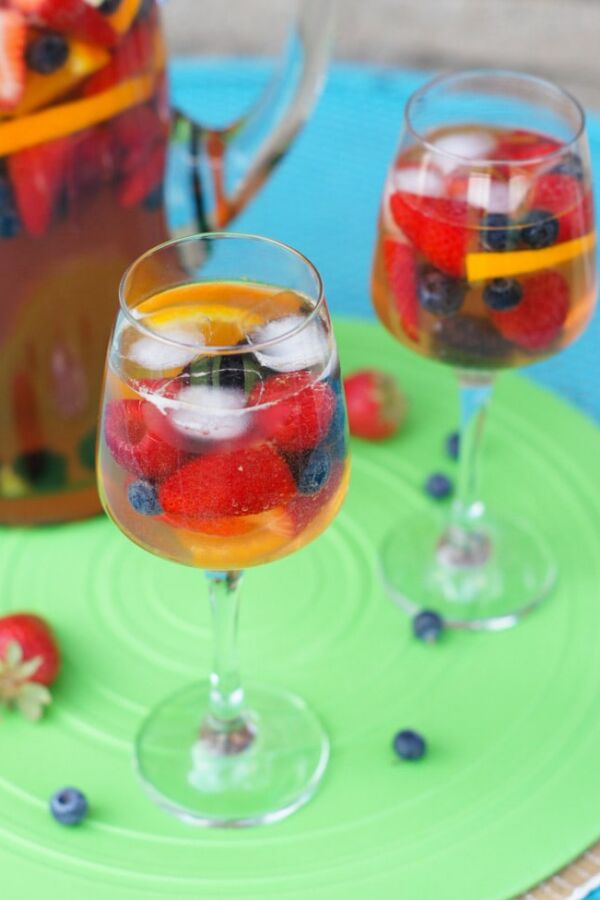 Sangria poured into two wine glasses.