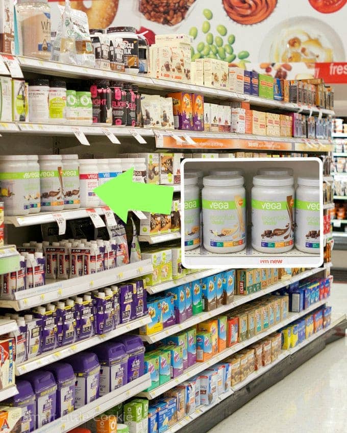 Shelves in a store with protein powder.