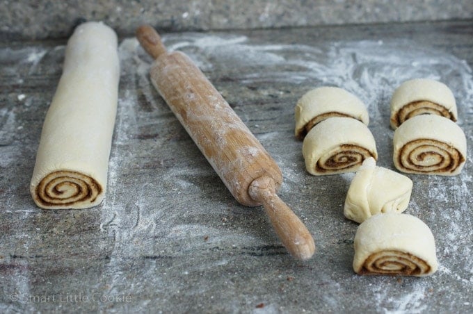 The pastry rolled up and cut into smaller pieces.