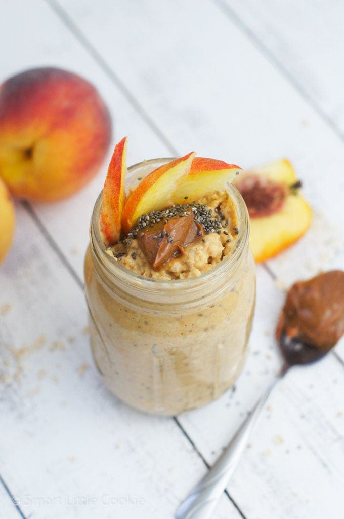 Peach overnight oats with toppings.