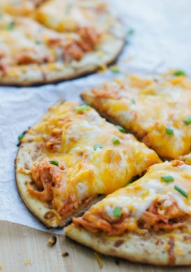 Cheesy, crispy, spicy and full of flavor! The perfect Game Day Buffalo Chicken Mini Pizza.