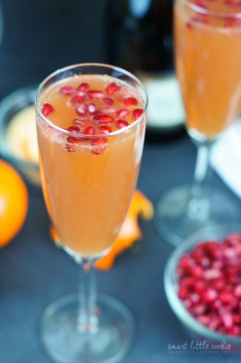 Close up of pomegranate seeds floating on top of the mimosa.