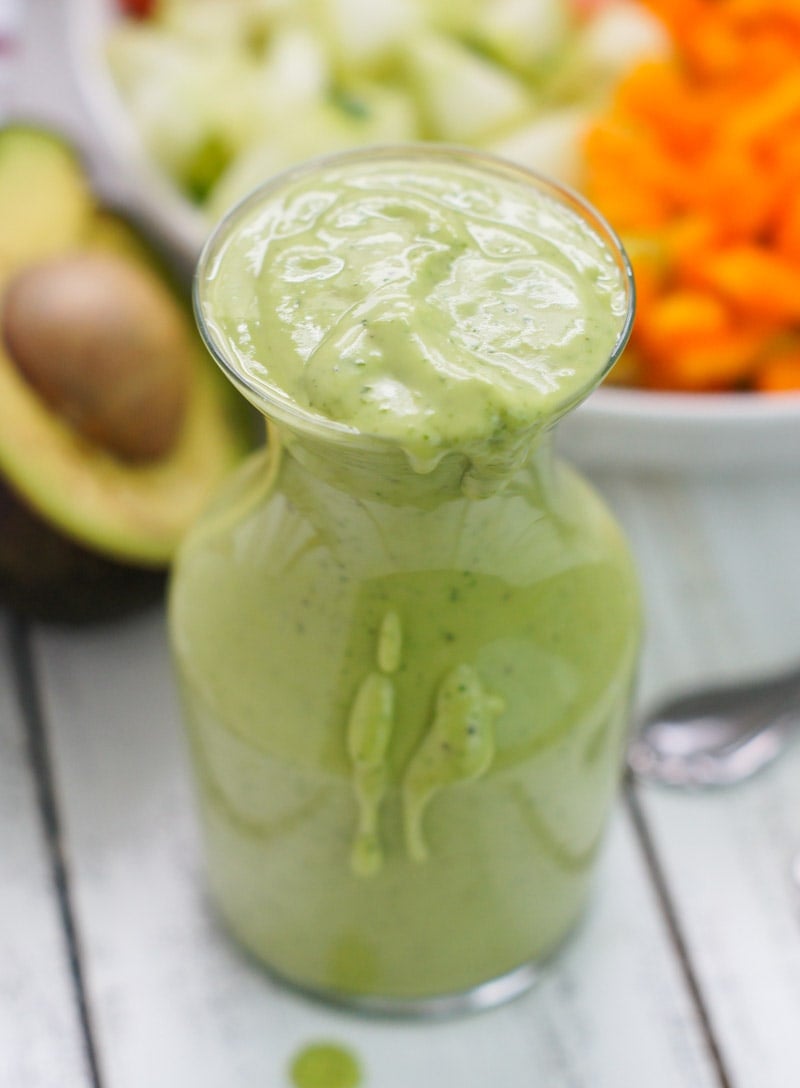 Creamy avocado cilantro dressing in a jar.