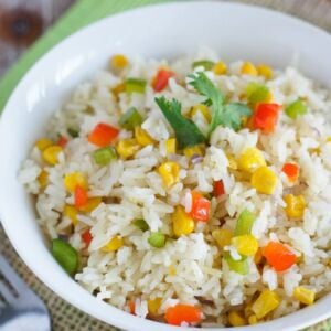 Close up of the arroz primavera garnished with fresh cilantro.