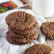 Five chocolate peanut butter cookies stacked on top of each other.