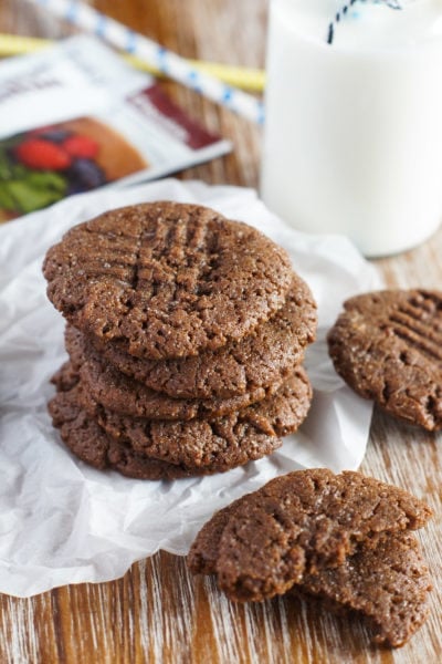 Five chocolate peanut butter cookies stacked on top of each other.
