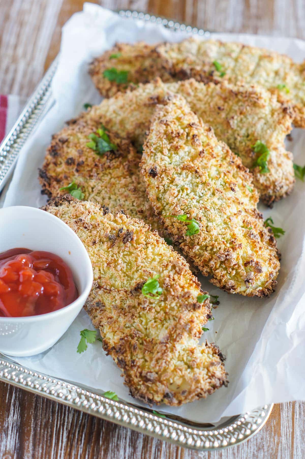 oven-baked chicken tenders served on a tray