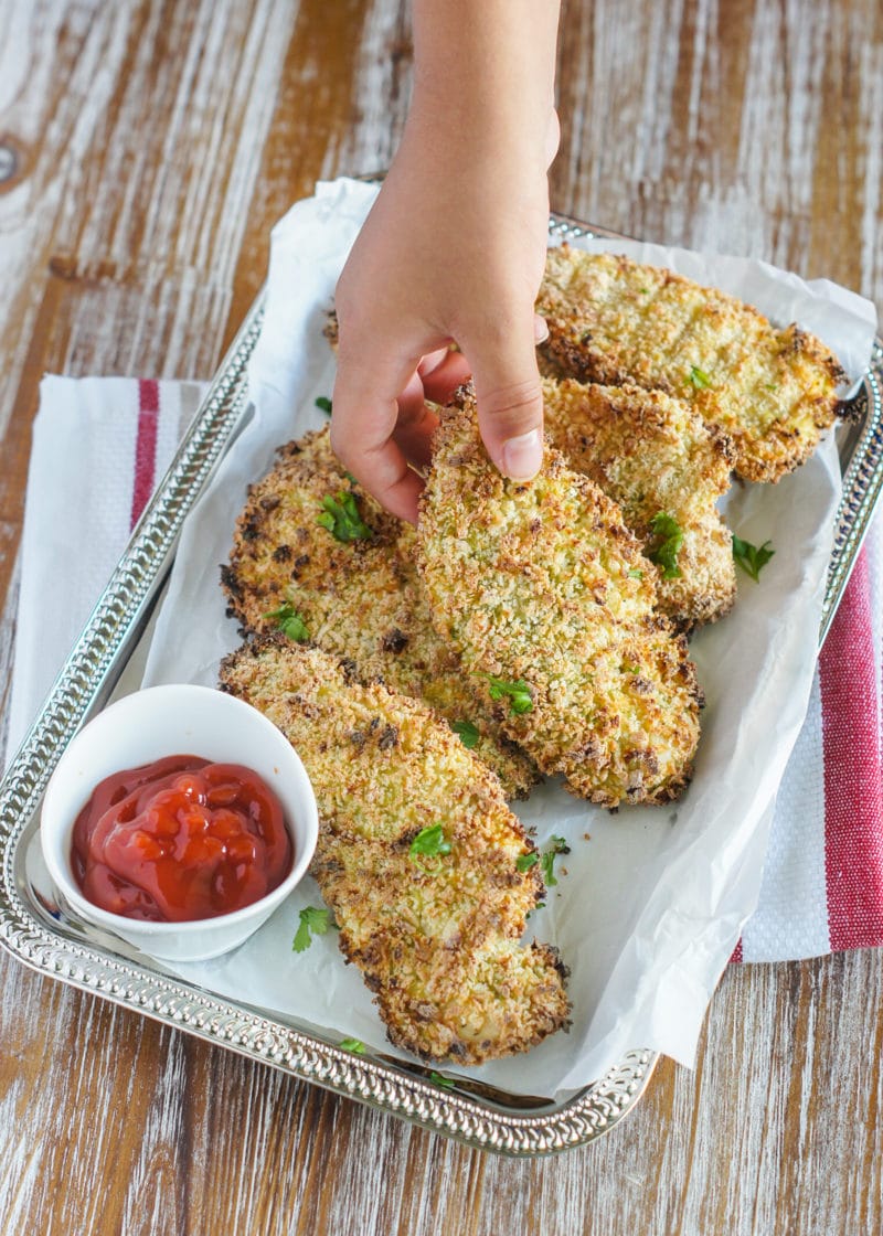 hand picking chicken tenders