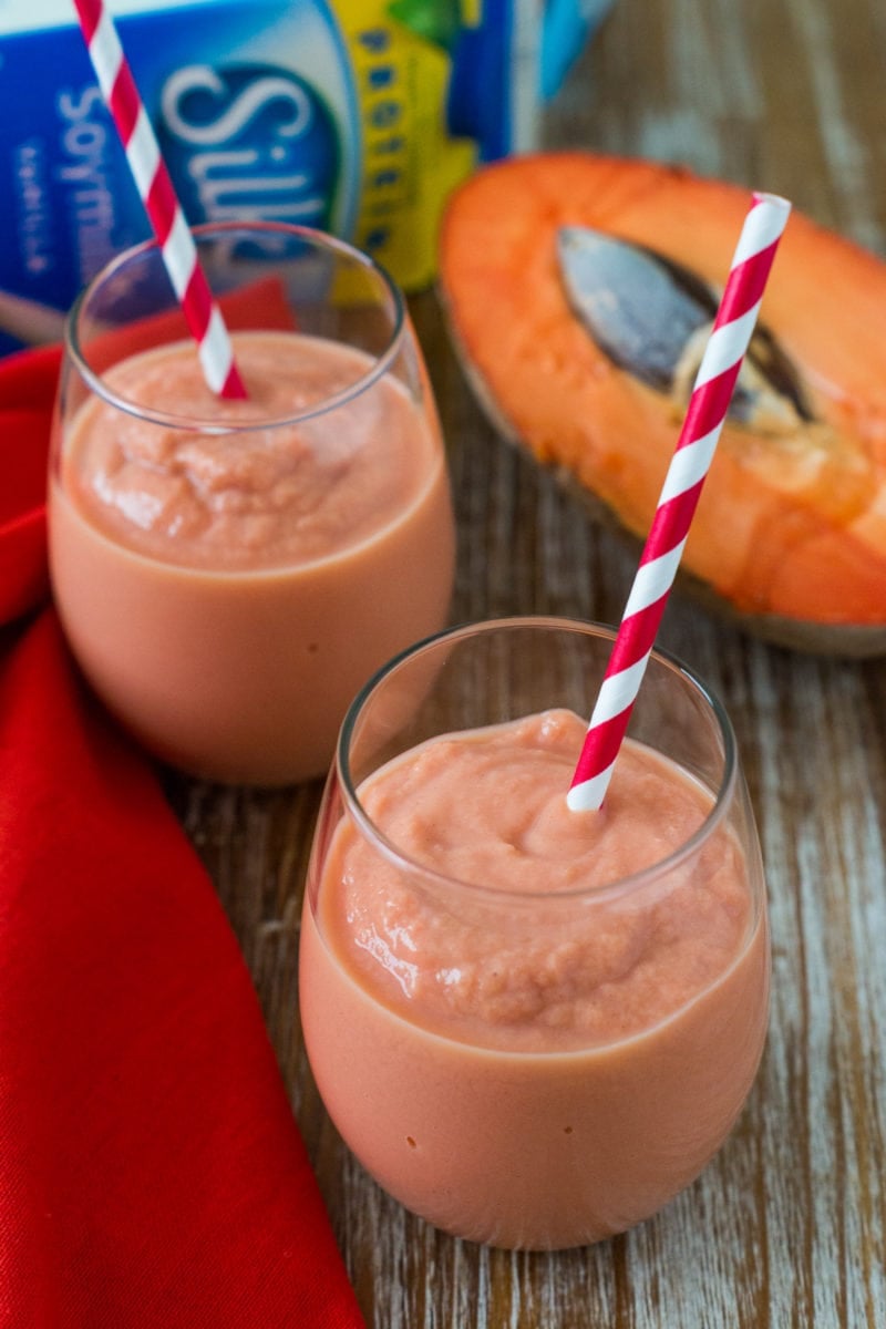 A mamey smoothie served in two glasses.