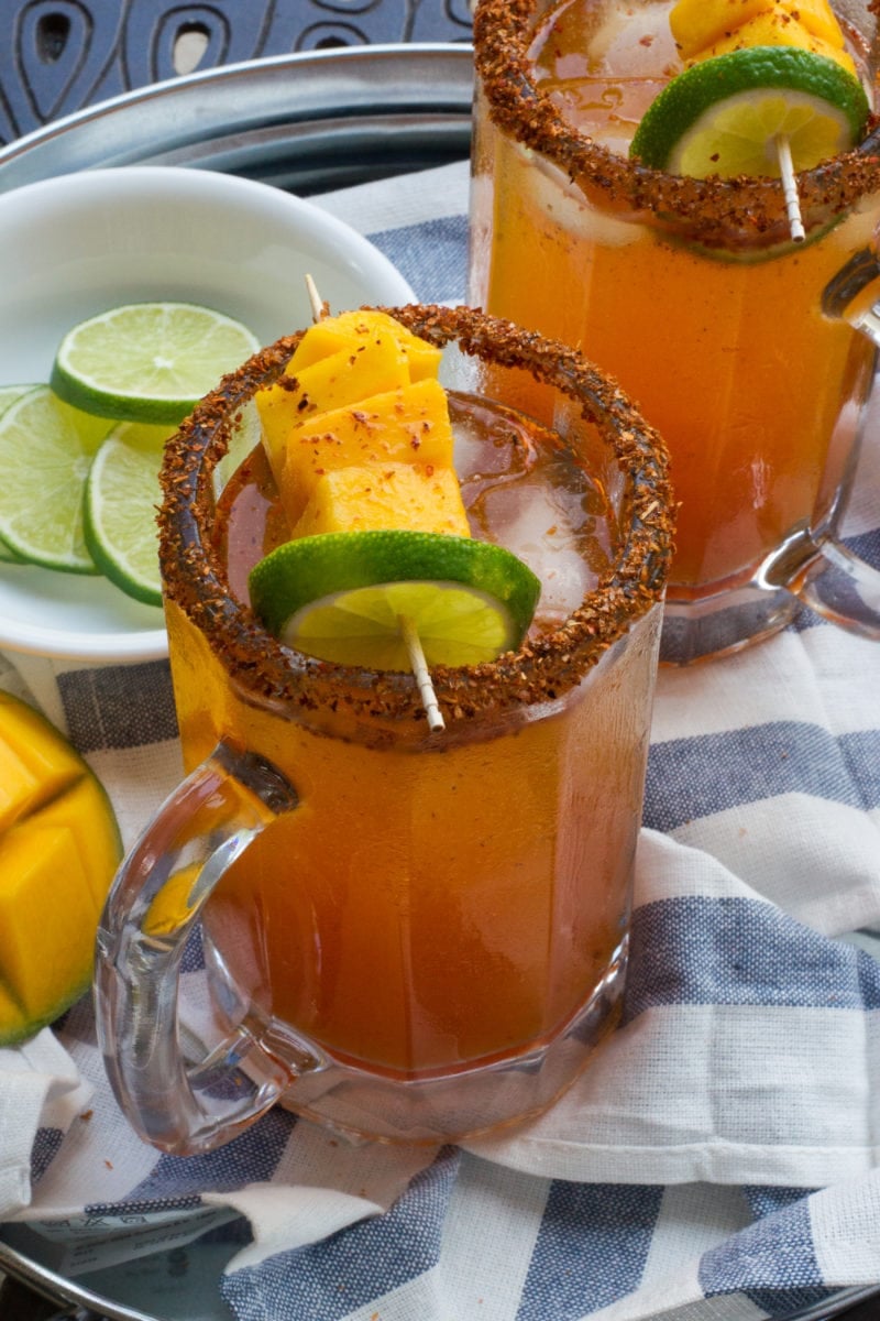 Spicy Mango Michelada served in large beer glass