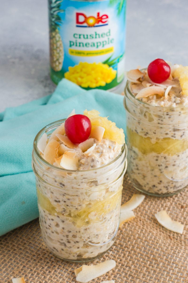 Two jars of the overnight oats ready to eat.