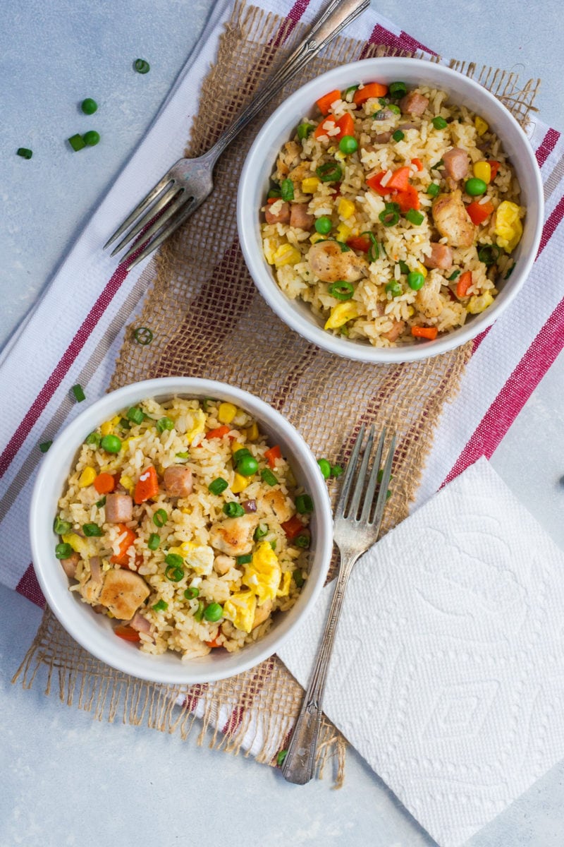 Overhead shot of two bowls of fried rice.