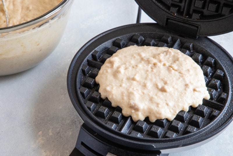 Churro Waffles batter in a waffle maker