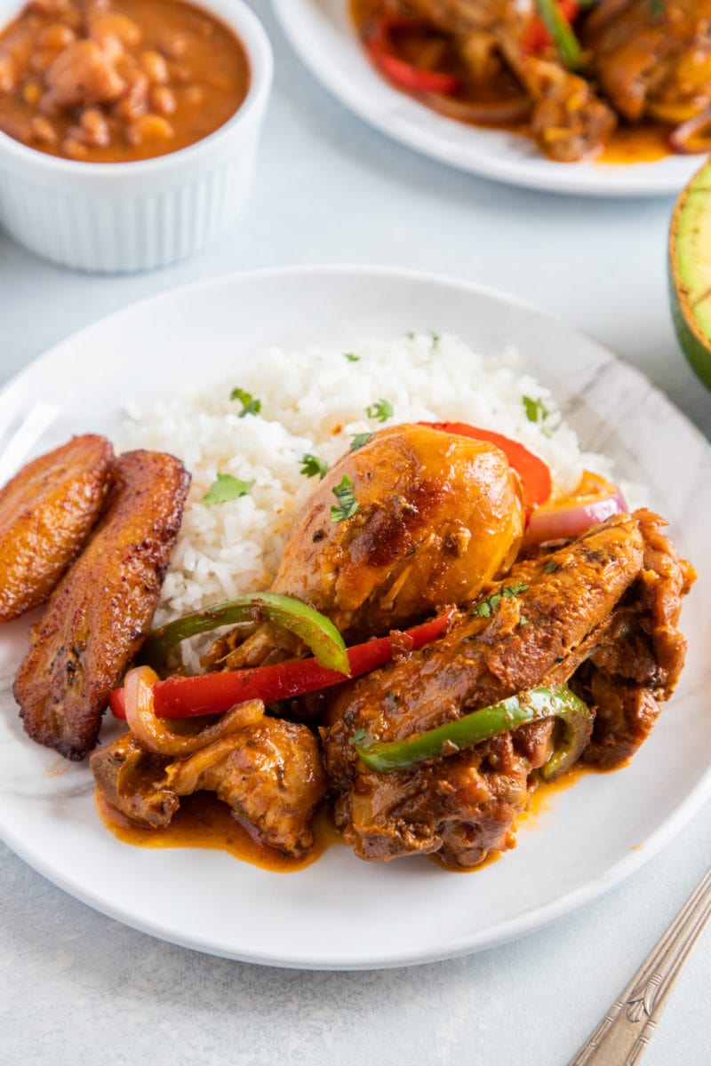 Close up of Dominican chicken served with rice.
