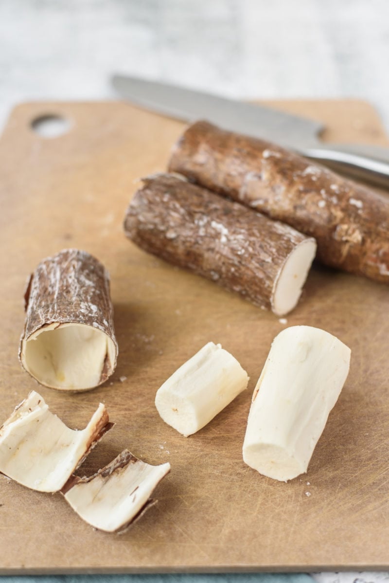 Peeled Yuca root on a cutting board