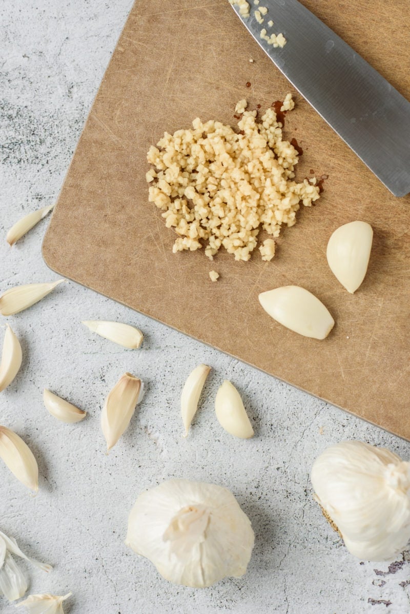 minced garlic on a chopping board