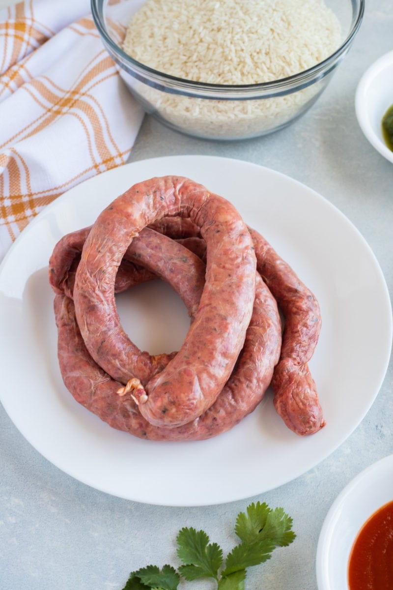 uncooked longaniza (Dominican sausage) on a plate.
