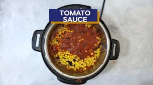 Tomato sauce added on top of the corn.
