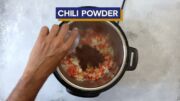 Chili powder added into the Instant Pot.