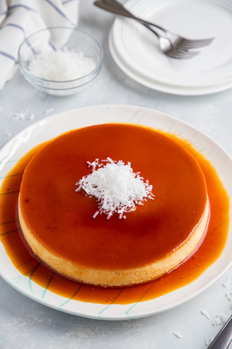 A coconut flan topped with shredded coconut
