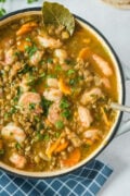 lentil stew with shrimp in a dutch oven