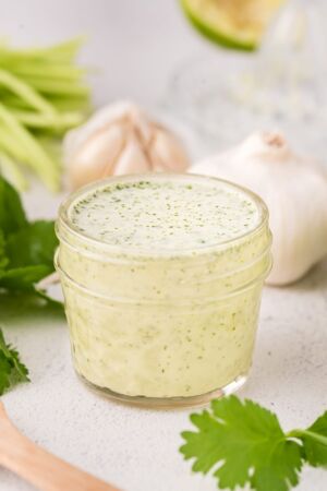 Cilantro lime dressing in a glass jar