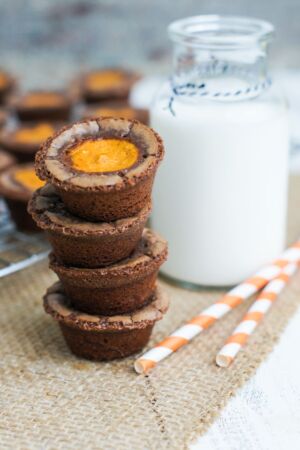 stocked brownie bites with a glass of milk