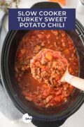 The chili being served out of the slow cooker Pinterest 3