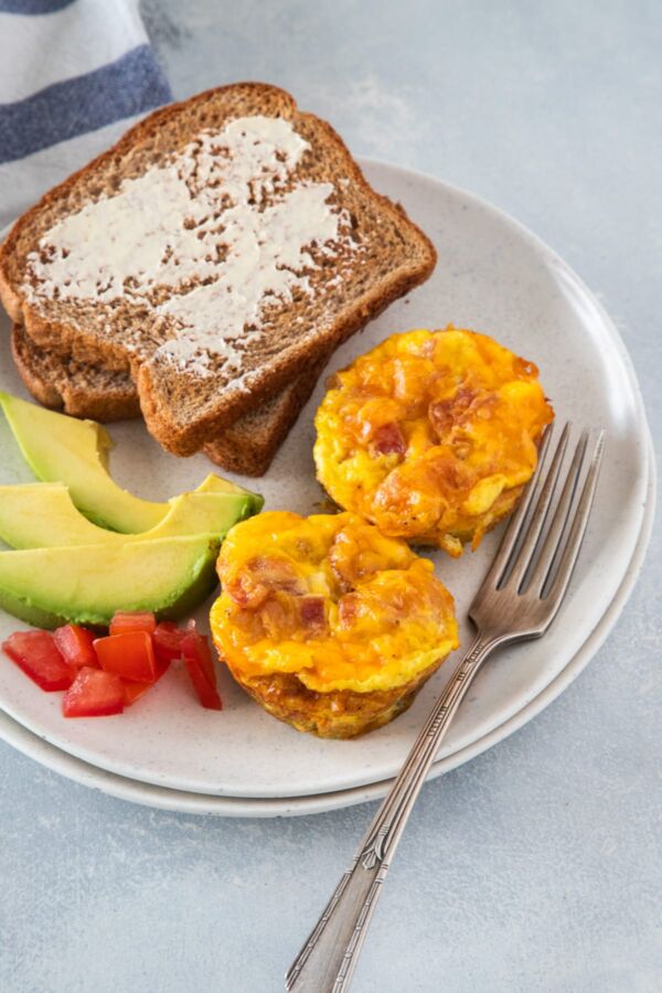 Bacon and Egg Muffins served with toast and avocado