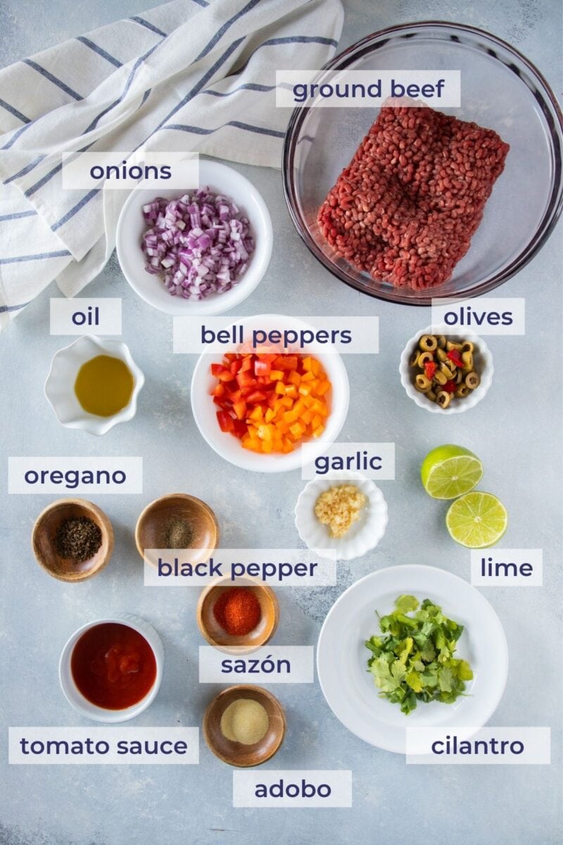 beef picadillo ingredients on a board
