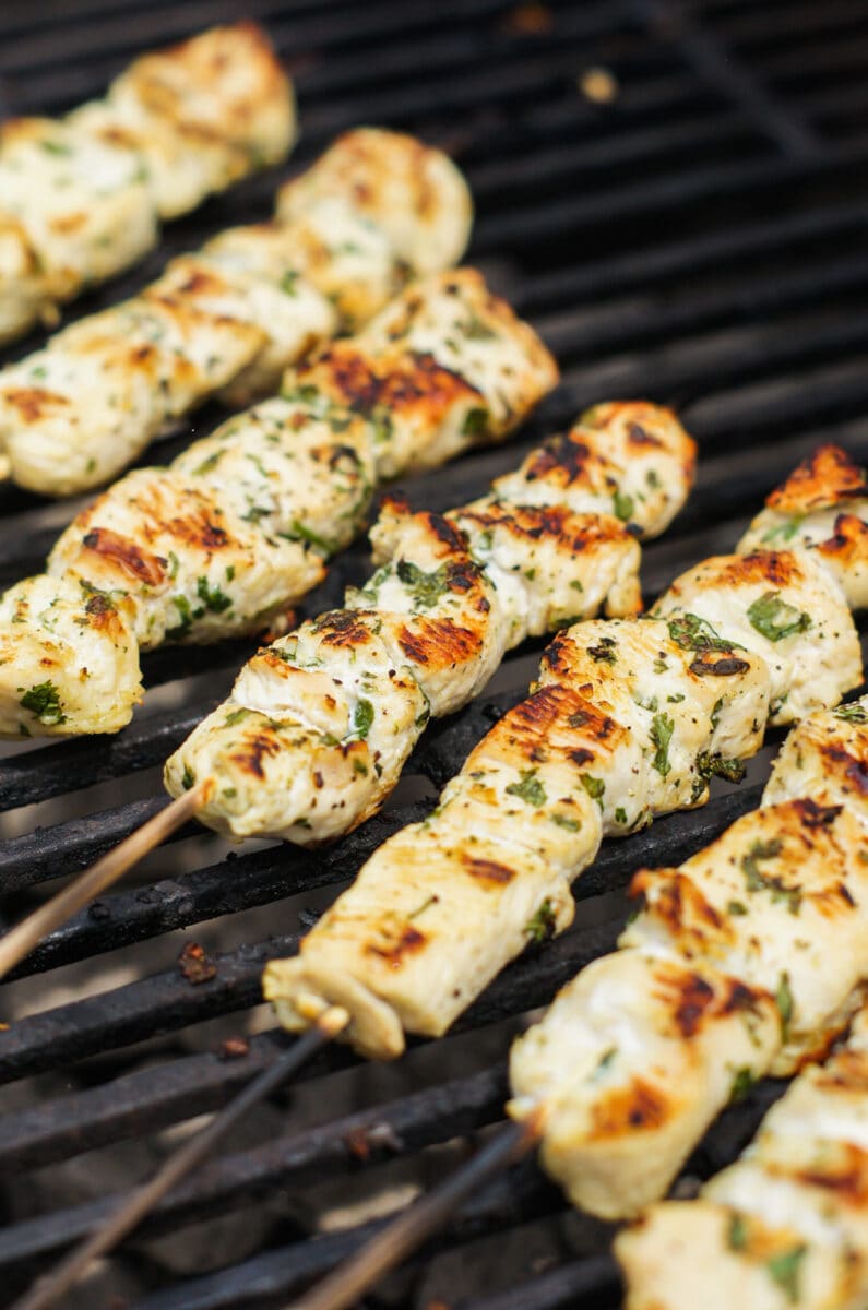 chicken skewers with garlic cilantro lime cooking on the grill