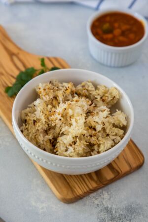 Pegao rice served in a white bowl.