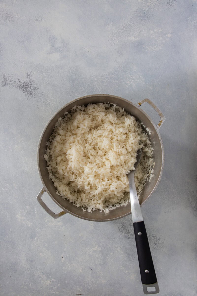 Fluffy Dominican white rice cooked in a pot.