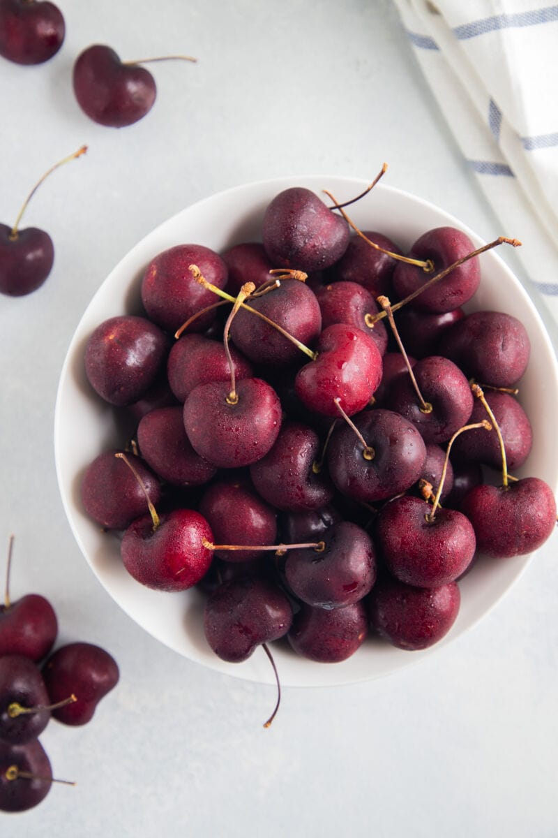 Cherries in a white bowl