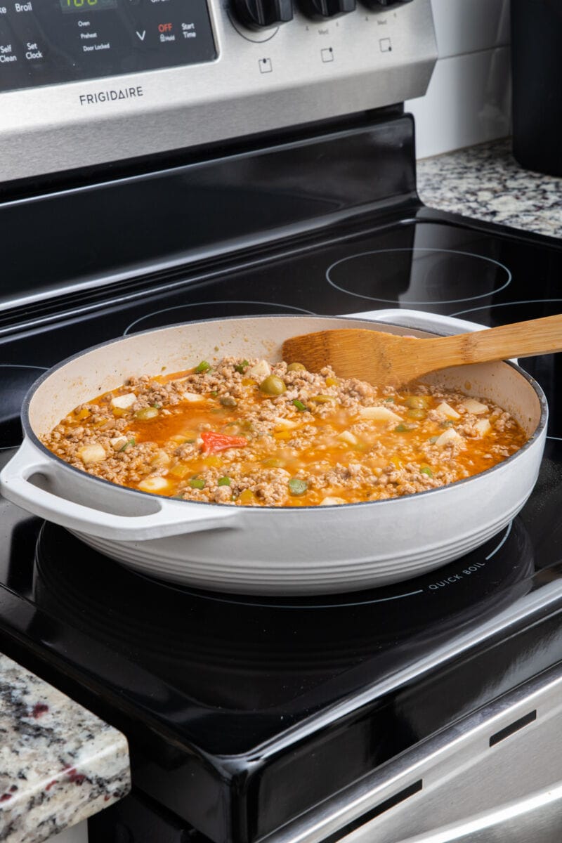 cooking minced pork on the stovetop