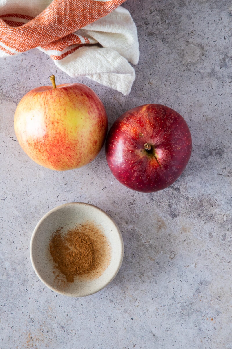 apples and spices on a counter