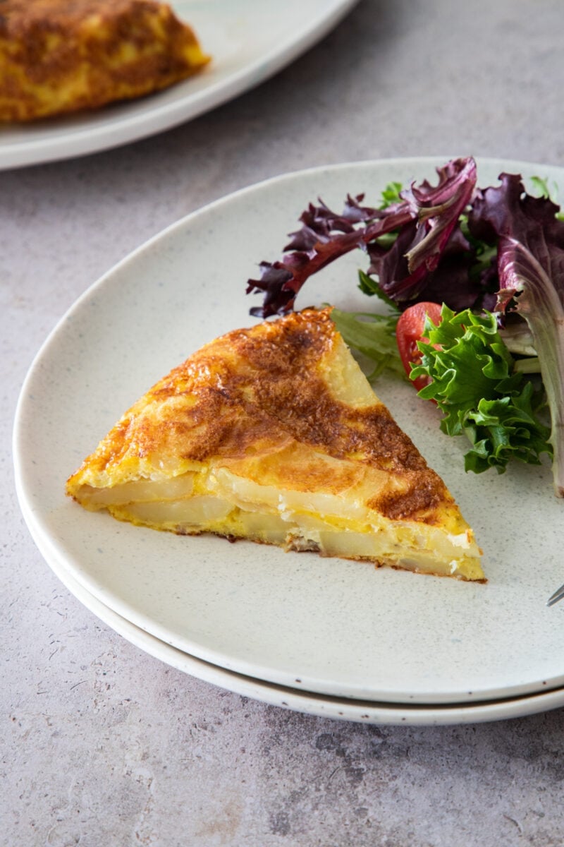 slice of tortilla española on a plate