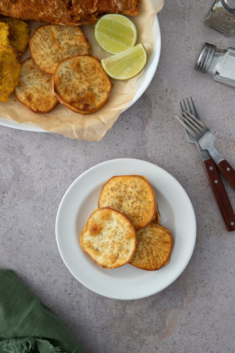 Crispy Dominican batata fries, golden and lightly salted—served with lime for the perfect sweet-savory bite.