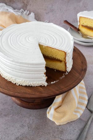 Dominican cake with dulce de leche filling and white meringue