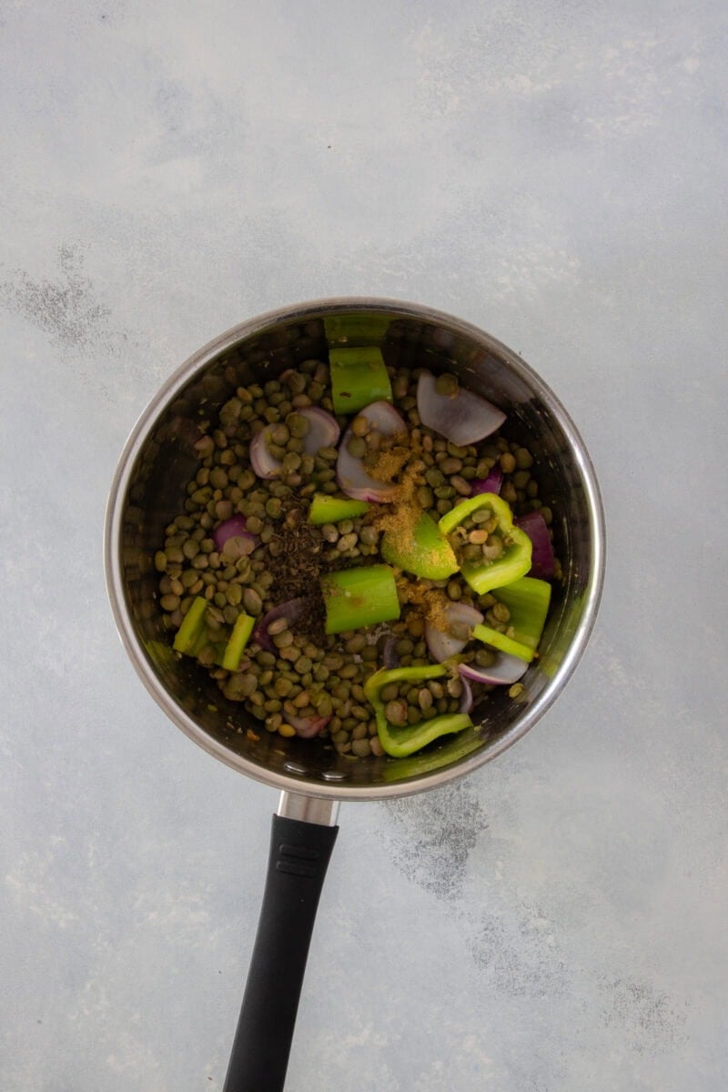 Cooked pigeon peas with red onion, bell pepper, and seasonings.
