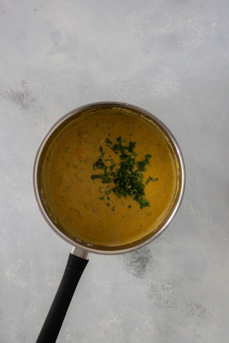 Smooth blended coconut and pigeon pea sauce.