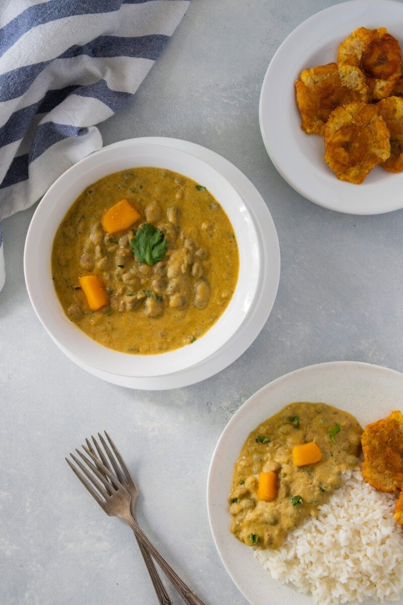 Guandules con coco served with pumpkin and tostones.